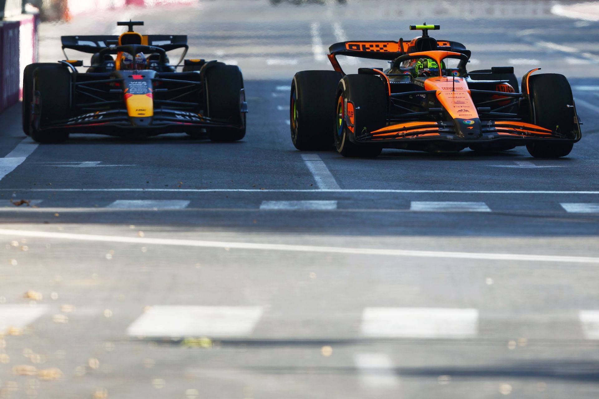 <a href='https://www.sportskeeda.com/player/lando-norris' target='_blank' rel='noopener noreferrer'>Lando Norris</a> of McLaren leads Max Verstappen of Red Bull Racing. Source: Getty Images